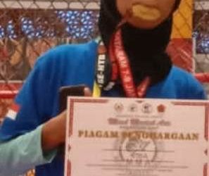 Jilbab Bukan Penghalang Raih Emas di IBA MMA