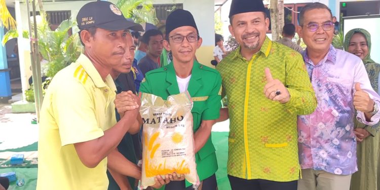 Peringati Harlah ke 90, GP Ansor Dompu Bagikan 150 Paket Sembako ke Pasukan Kuning